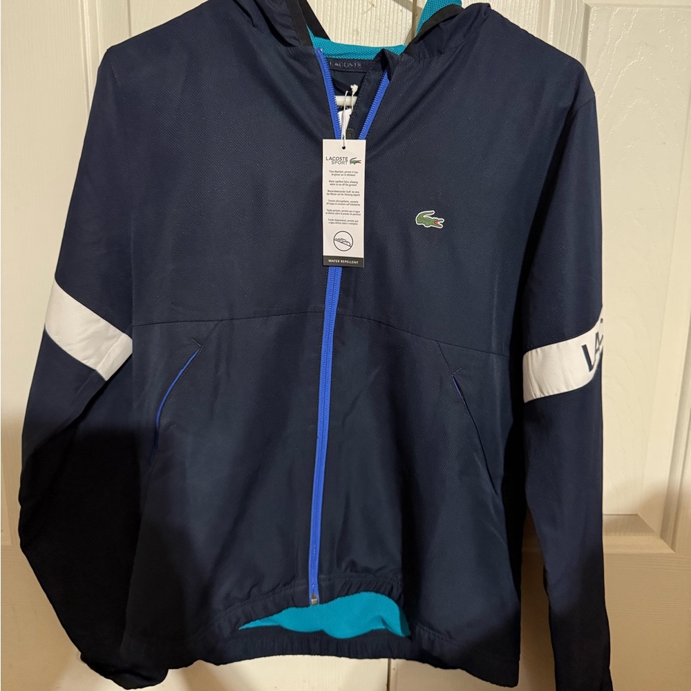 Lacoste Blue Raincoat with White Accents and Hood